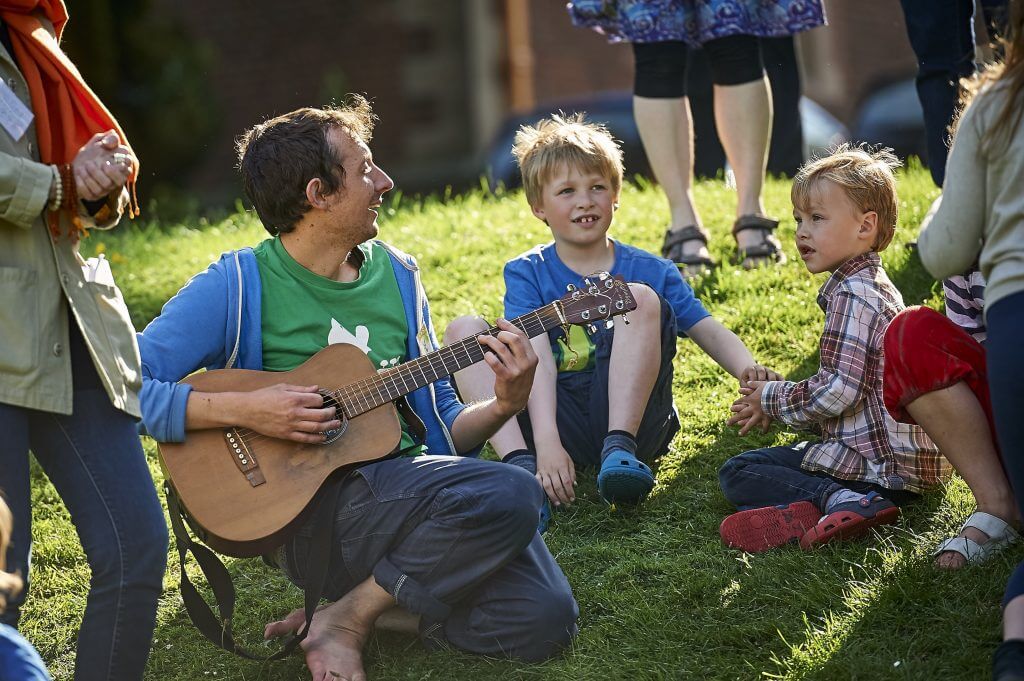 Children singing on family retreat