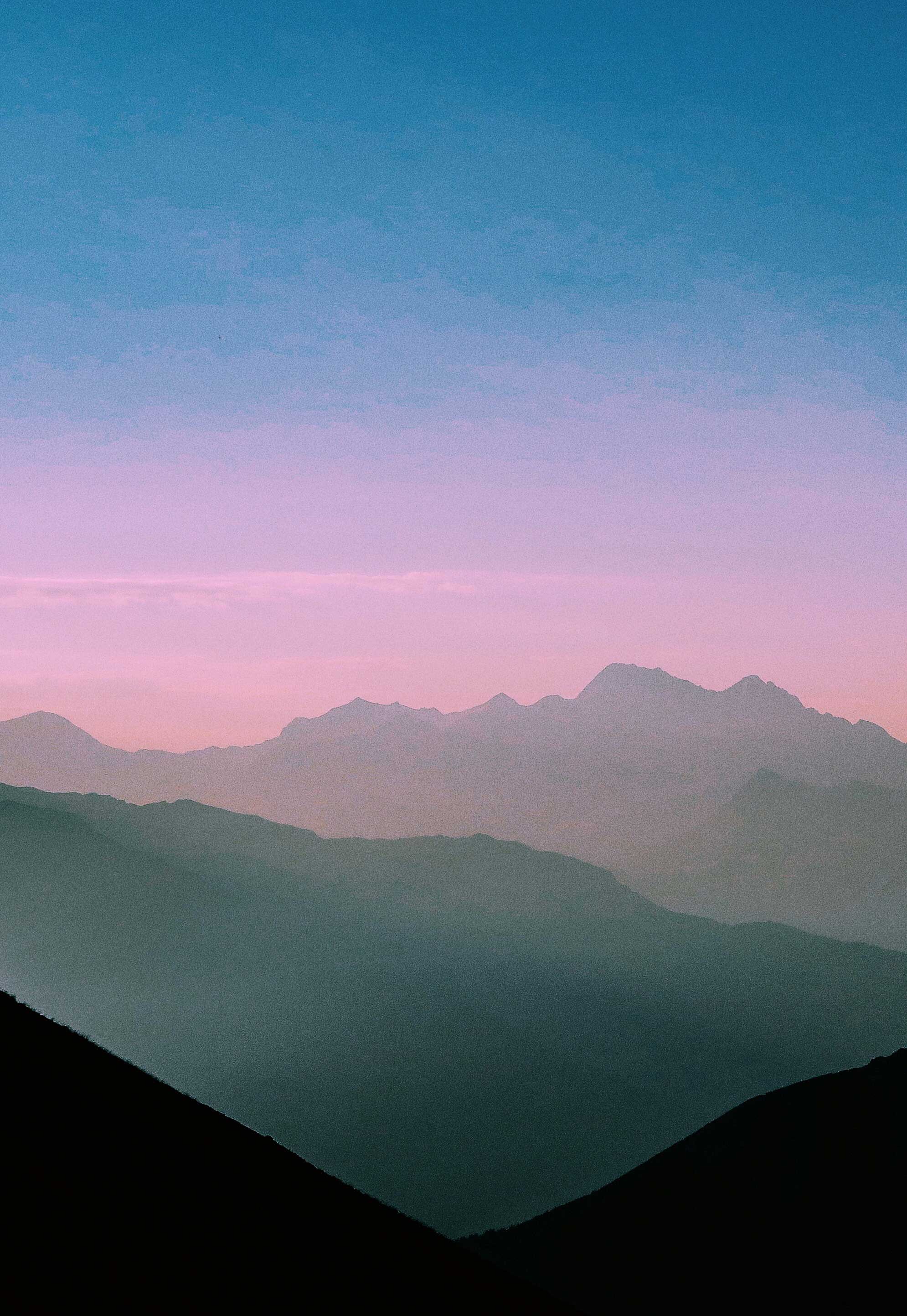 hazy sunset over mountains